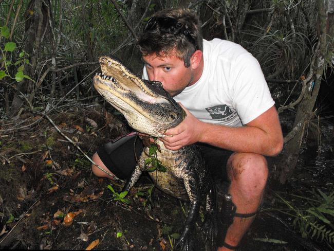 Forrest alligator wrestling in Florida.