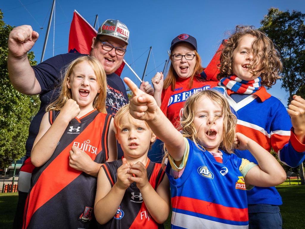 Footy fans Shaun Dux and Janet Traynor with Isla, 6, Patrick, 3, Rose, 3 and Artie, 9. Picture: Jake Nowakowski