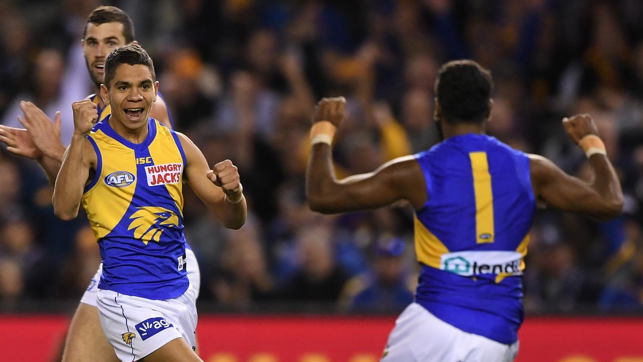 Jarrod Cameron reacts after kicking a goal. AAP Image/Julian Smith)