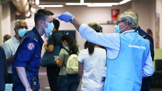 A frontline worker arrives at The Royal Prince Alfred Hospital to participate in the Pfizer vaccination program in Sydney today. Picture: Getty Images