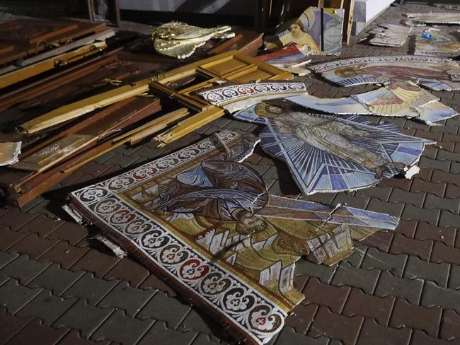 Fragments of religious icons are laid out near the damaged Transfiguration Cathedral as a result of a missile strike in Odessa. Picture: AFP