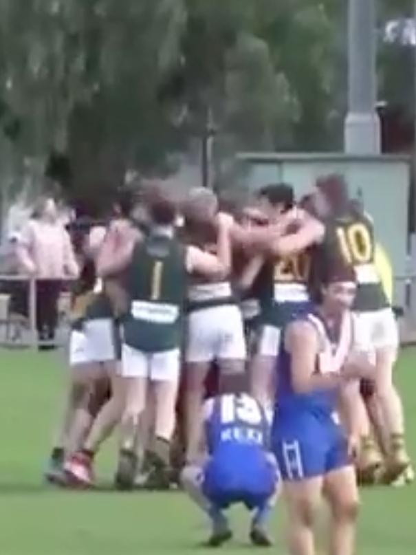 McIntyre is mobbed as Salisbury North celebrates his winning goal. Source: Filming Footy