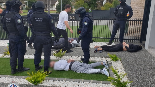 At a home in Fairfield West police arrested four men in their 20s. Picture: NSW Police