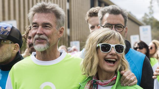 Olivia Newton-John and husband John Easterling during the annual Wellness Walk and Research Run in 2018 in Melbourne. Picture: Naomi Rahim