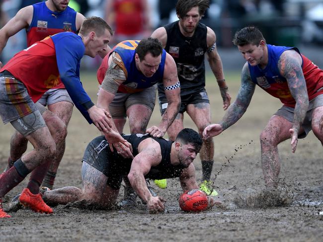 East Burwood and Fairpark slog it out in the grand final. Picture: Andy Brownbill