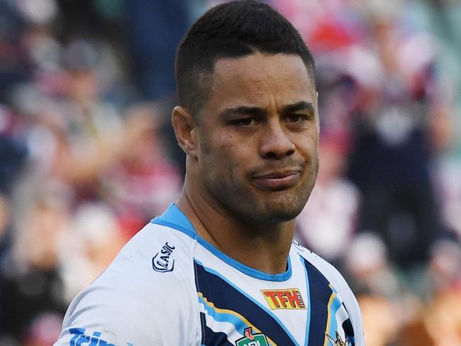 Jarryd Hayne of the Titans gestures after accidentally kicking the ball into touch which then allowed the Roosters to get possession, score and win the game during the NRL Round 26 rugby league match between the Sydney Roosters and Gold Coast Titans at the Allianz Stadium in Sydney, Saturday, September 2, 2017. (AAP Image/David Moir) NO ARCHIVING, EDITORIAL USE ONLY