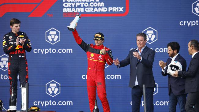 Carlos Sainz of Spain and Ferrari celebrates on the podium