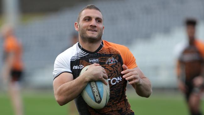 Pics of Robbie Farah and coach Jason Taylor at Wests Tigers training at Campbelltown Stadium.