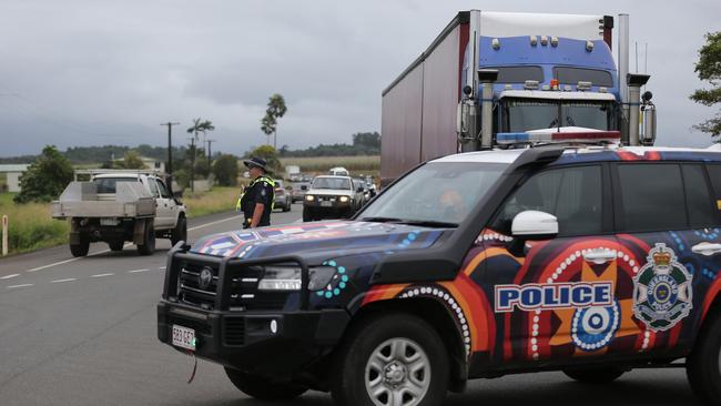 Police at the scene of a two-vehicle crash on the Bruce Hwy at Fitzgerald Creek, five minutes north of Innisfail. Picture: Arun Singh Mann