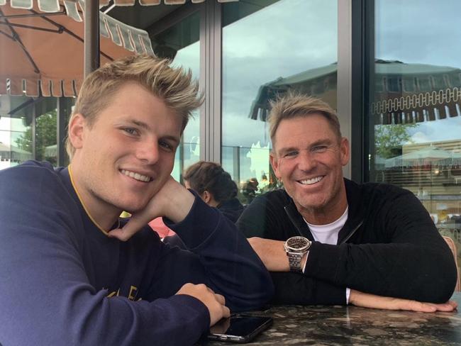 Shane Warne, pictured with his son Jackson, turned 50 this month.