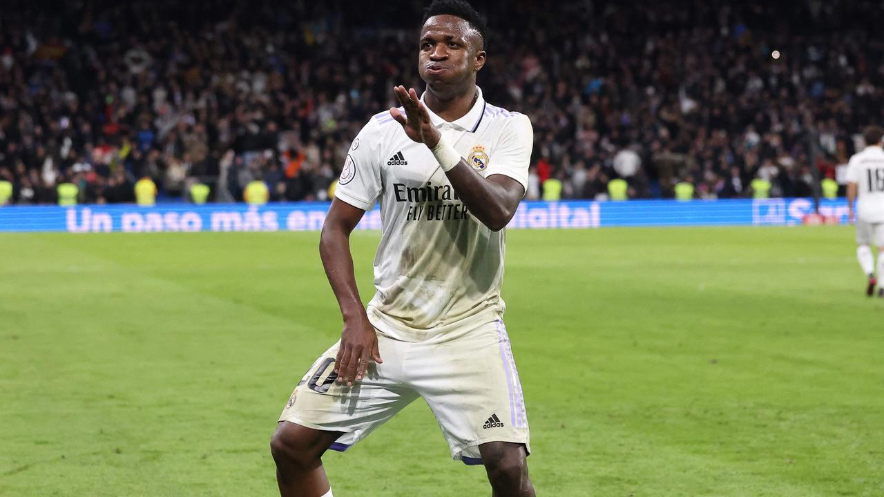 Real Madrid's Brazilian forward Vinicius Junior celebrates after scoring his team's third goal during the Copa del Rey (King's Cup), quarter final football match between Real Madrid CF and Club Atletico de Madrid at the Santiago Bernabeu stadium in Madrid on January 26, 2023. (Photo by Pierre-Philippe MARCOU / AFP)