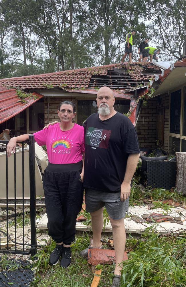 The couple outside their home.