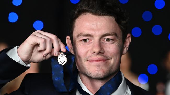 BRISBANE, AUSTRALIA - OCTOBER 18: Lachie Neale of the Lions poses with the Brownlow medal at the Gabba during the 2020 AFL Brownlow Medal count on October 18, 2020 in Brisbane, Australia.  (Photo by Quinn Rooney/Getty Images)