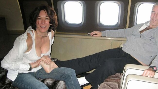 Ghislaine Maxwell is photographed massaging Jeffrey Epstein's feet. Picture: AFP/Southern District Court of New York