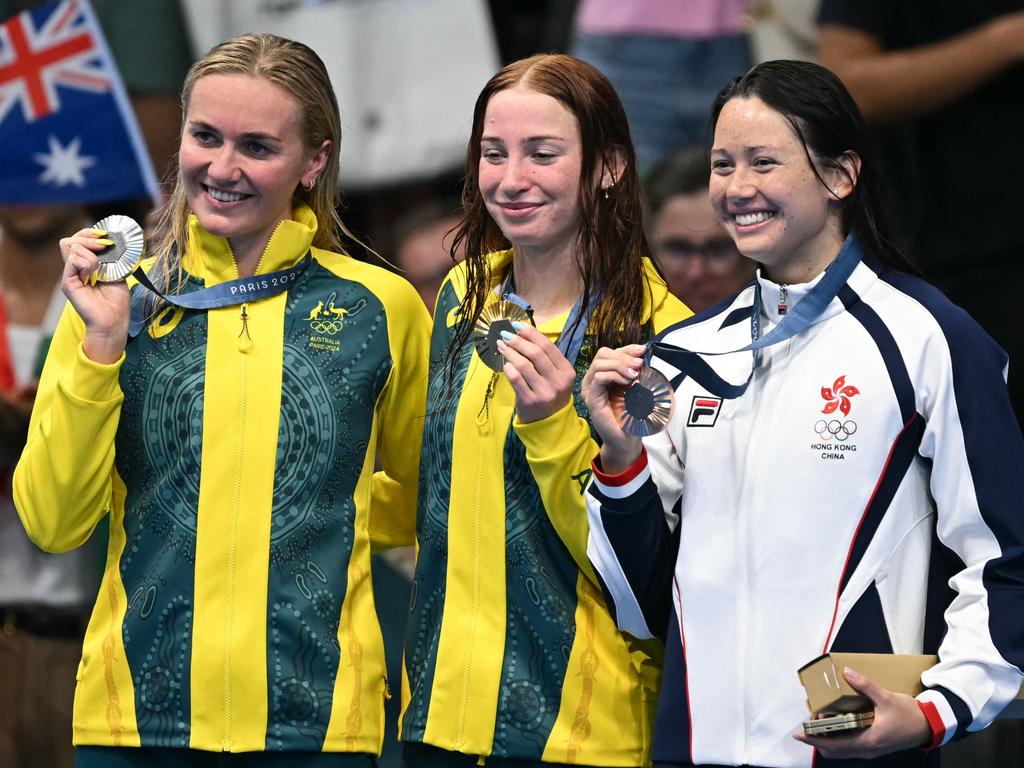 Gold medallist Mollie O'Callaghan, centre, with Ariarne Titmus, far left, and bronze medallist Hong Kong's Haughey Siobhan Bernadette. Picture: AFP