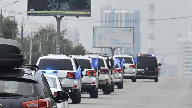 UN'vehicles carrying International Atomic Energy Agency inspectors leave Zaporizhzhia on Thursday. Picture: AFP