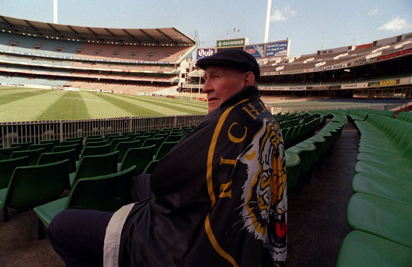 <p>15: JACK DYER. Jack "Captain Blood" Dyer shows his colours in a Richmond banner. Dyer was a legend of the Richmond club, and an icon to the working classes of the 1930s in Victoria for his tenacity on the field.</p>