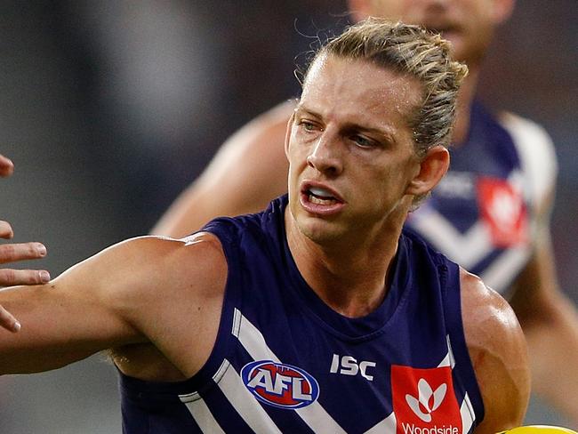 PERTH, AUSTRALIA - MAY 12: Nathan Fyfe of the Dockers fends off Jade Gresham of the Saints during the round eight AFL match between the Fremantle Dockers and the St Kilda Saints at Optus Stadium on May 12, 2018 in Perth, Australia.  (Photo by Paul Kane/Getty Images)