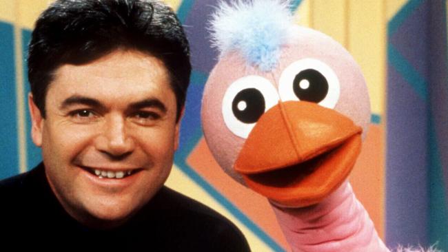 Host Daryl Somers with puppet Ossie Ostrich in 1990s TV show 'Hey, Hey It's Saturday'.