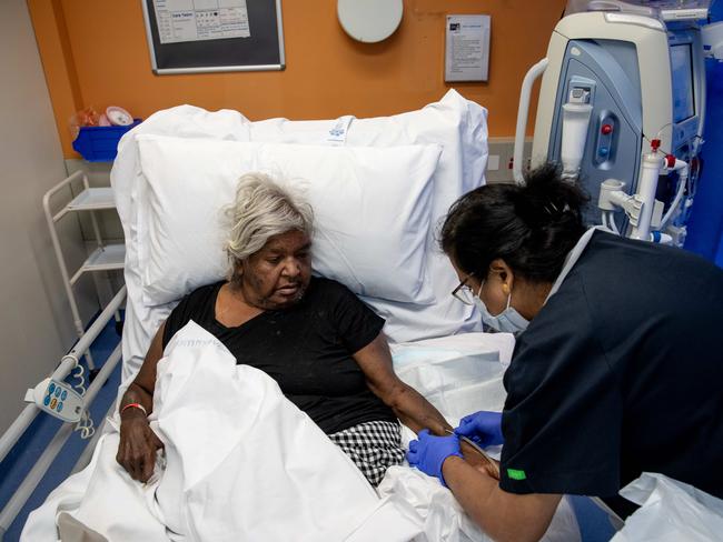 Diabetes and renal patient Julie Cline, who lives at the Little Sisters town camp in Alice Springs, receiving dialysis. Ms Cline says diabetes sufferers are dying waiting for dialysis chairs. Picture: Liam Mendes / The Australian