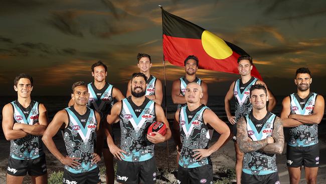 Port Adelaide ruckman Patrick Ryder has designed the Power’s special jumper for the AFL Indigenous Round in June to not only acknowledge the club’s 10 indigenous players — from left front row, Joel Garner, Dom Barry, Ryder, Sam Powell-Pepper, Chad Wingard; from left second row, Steven Motlop, Aidyn Johnson, Jake Neade, Karl Amon and Lindsay Thomas — but also the football club and the Port Adelaide district. Picture: Sarah Reed.