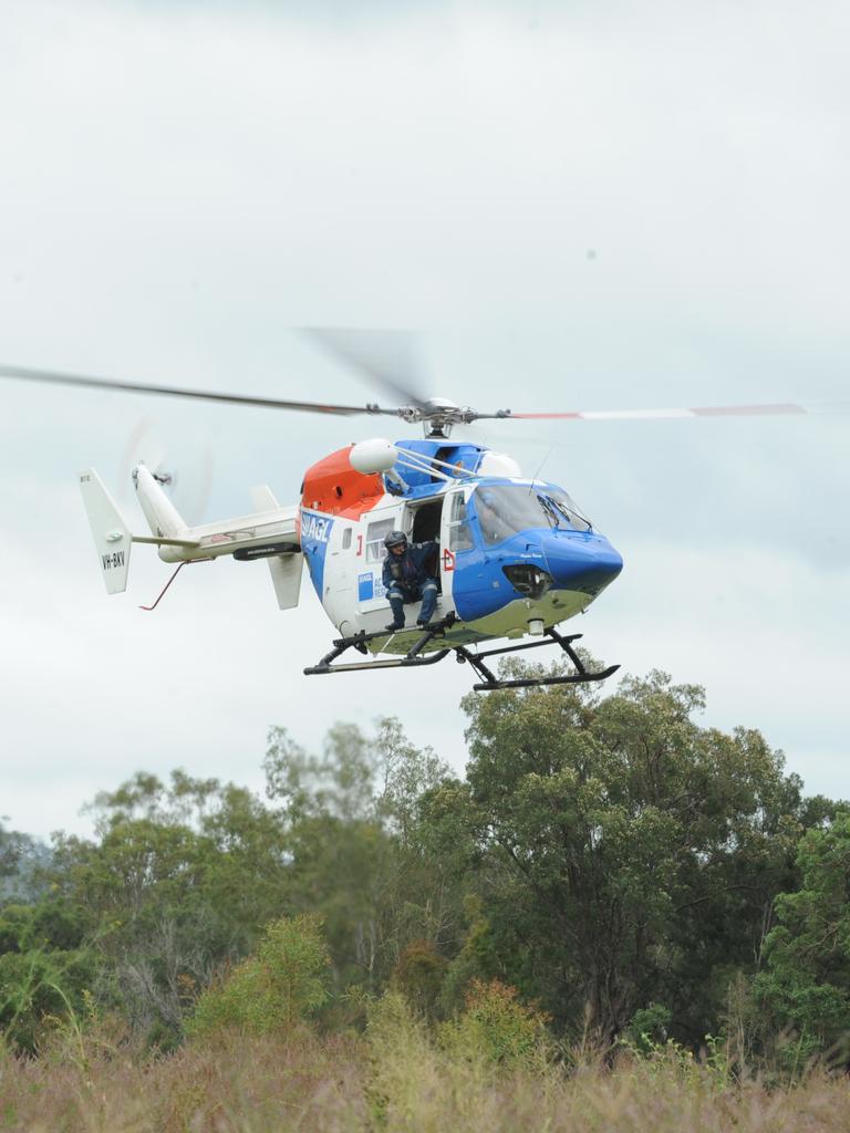 An AGL rescue helicopter searches for Paul Stevenson. Photo: Mike Knott/NewsMail