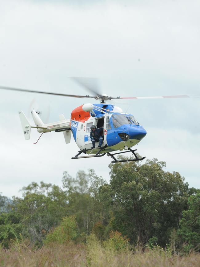 An AGL rescue helicopter searches for Paul Stevenson. Photo: Mike Knott/NewsMail