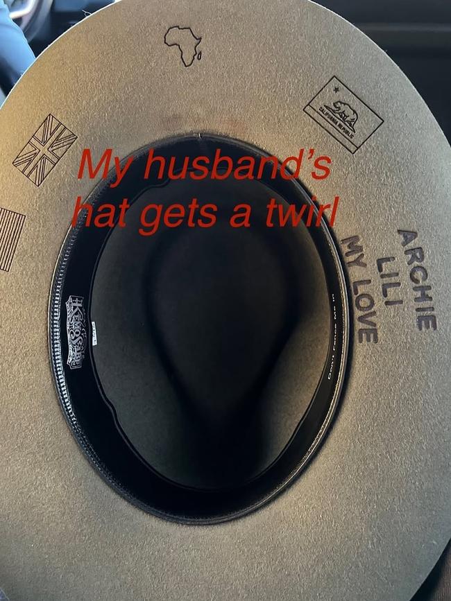 She shared a look at Harry’s hat – which is inscribed with their children’s names.