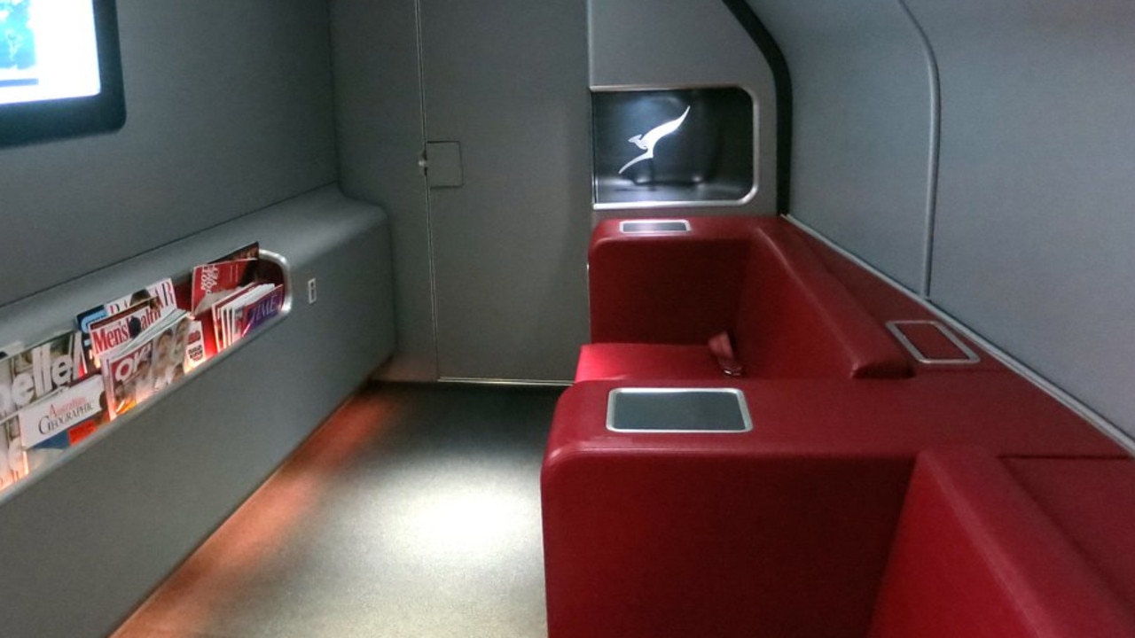 The old A380 lounge had bench-style seats facing a wall.