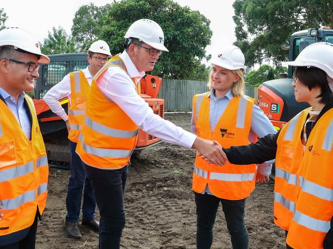 The Premier greets Carmen La and Shaun James who are youth advisers into mental health due to their own personal experiences. Picture: Ian Currie.