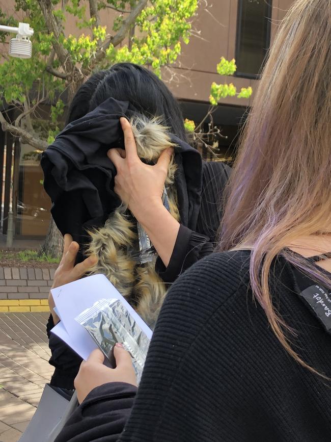 Lie Ke and her daughter Xiayou outside Parramatta Local Court.