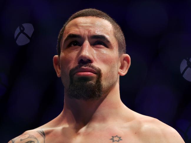 HOUSTON, TEXAS - FEBRUARY 12: Robert Whittaker of Australia looks on before his middleweight championship fight against Israel Adesanya of Nigeria during UFC 271 at Toyota Center on February 12, 2022 in Houston, Texas. Carmen Mandato/Getty Images/AFP == FOR NEWSPAPERS, INTERNET, TELCOS &amp; TELEVISION USE ONLY ==