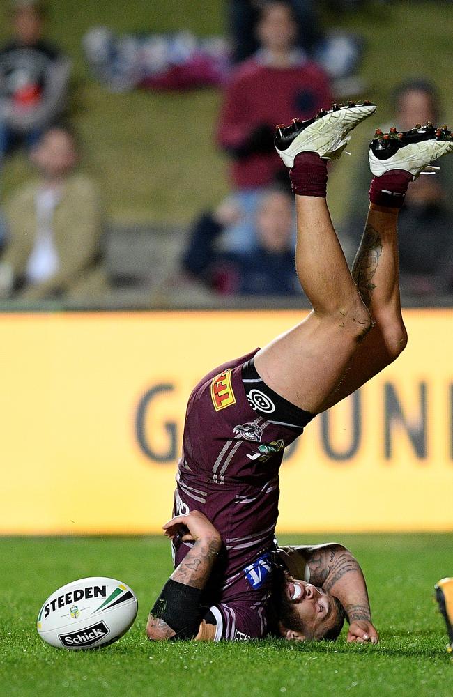 Joel Thompson scores a try in unorthodox fashion. (AAP Image/Dan Himbrechts)