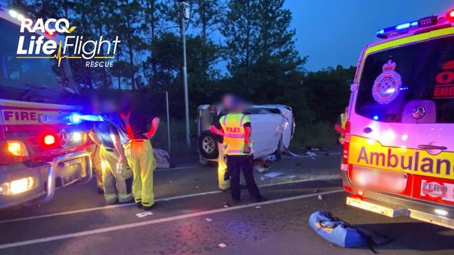 A woman was seriously injured after her car rolled three times on the Old Bruce Highway. Photo: LifeFlight