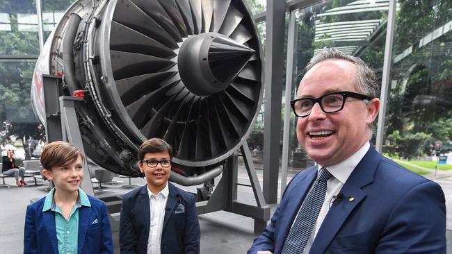 Qantas chief Alan Joyce, right, meets with the ten-year-old CEO of Oceania Express, Alex Jacquot, centre, and his deputy CEO Wolf Stringer.