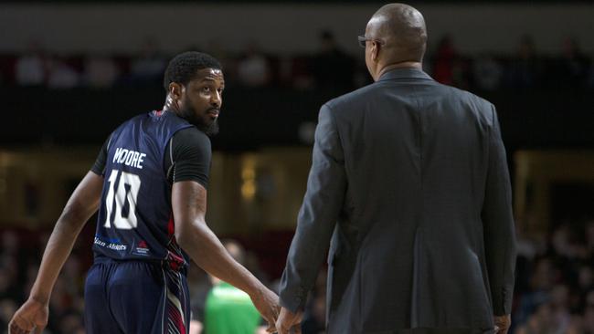 Coach Joey Wright speaks with Ramone Moore during play. Picture: Emma Brasier (AAP).