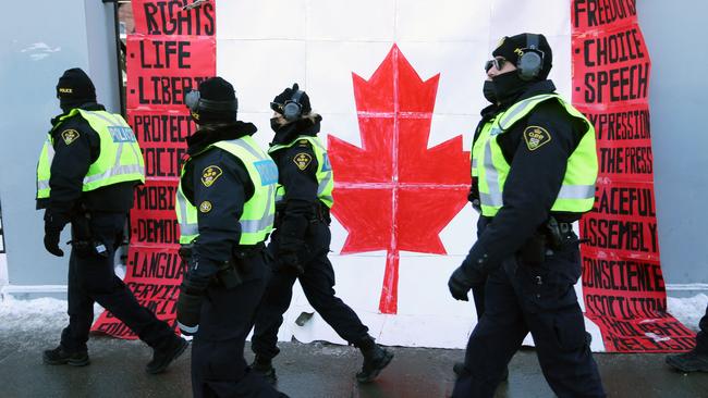 Police officers on Parliament Hill as demonstrators continue to protest the vaccine mandates in Ottawa. Picture: AFP.