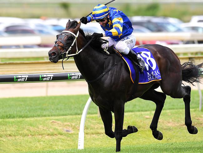 Jockey Larry Cassidy rides Snitzkraft to win race 4, the Magic Millions Falvelon Quality, during the Road to Magic Millions Raceday at Doomben Racecourse in Brisbane, Saturday, December 30, 2017.(AAP Image/Albert Perez) NO ARCHIVING, EDITORIAL USE ONLY