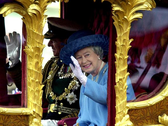 The Queen waves to crowds during her Golden Jubilee in 2002. Picture: AFP