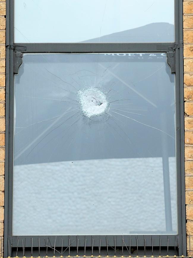 What appear to be bullet holes in a Boutique nightclub window. Picture: Tim Carrafa