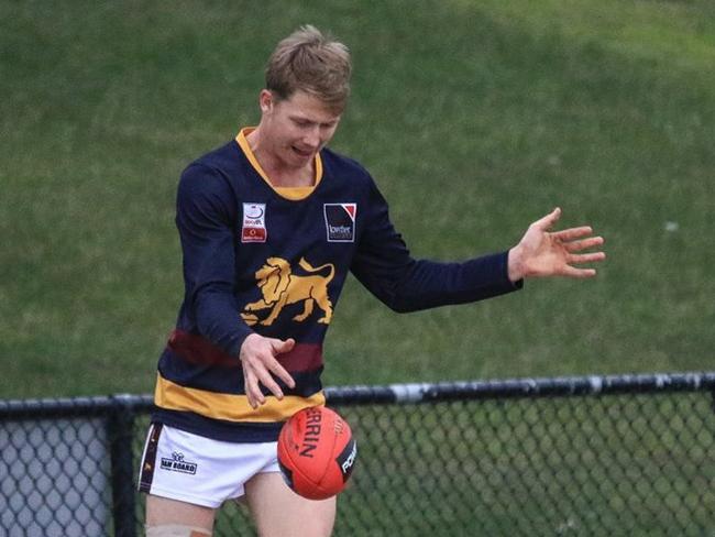 Jack Martin gets a kick away for Doncaster East in the Eastern Football League (EFL). Picture: Davis Harrigan