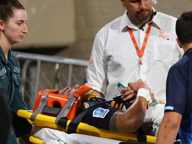 Lolesio stretchered from the field in Perth. Picture: Paul Kane/Getty Images