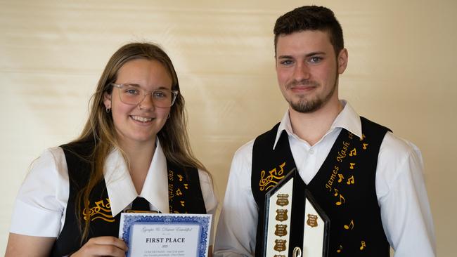 Congratulations Phoebe Penny and Thomas Allen, who triumphantly hold the winning trophy for the James Nash State High School Concert Band. July 31, 2023. Picture: Christine Schindler