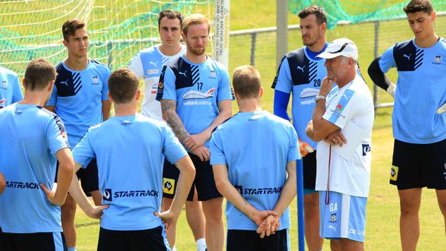 Sydney FC Coach Graham Arnold addresses the players before training at McQuarie Park. pic mark evans