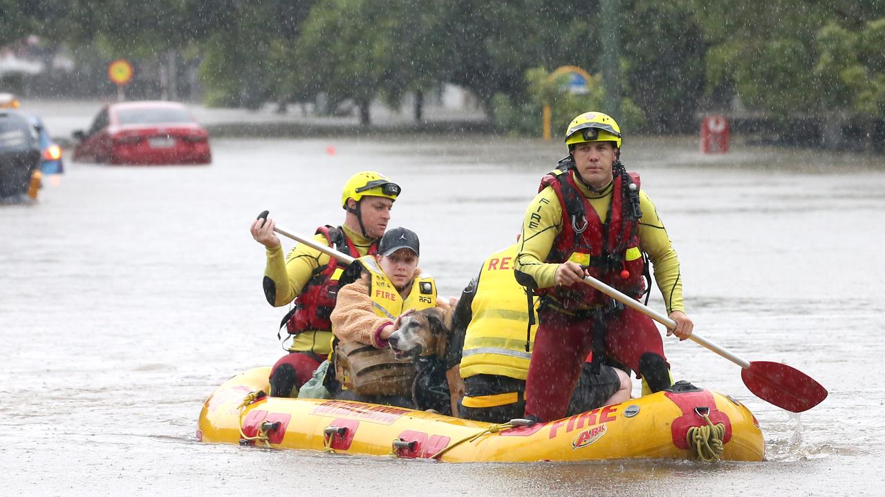 Adin Richardson and Karina Yandall and Detroit the dog were rescued from their house on Haig Rd, Milton. Picture: Steve Pohlner