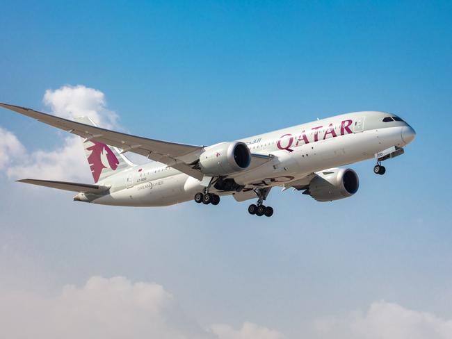 ESCAPEQatar Airways planePhoto - Qatar