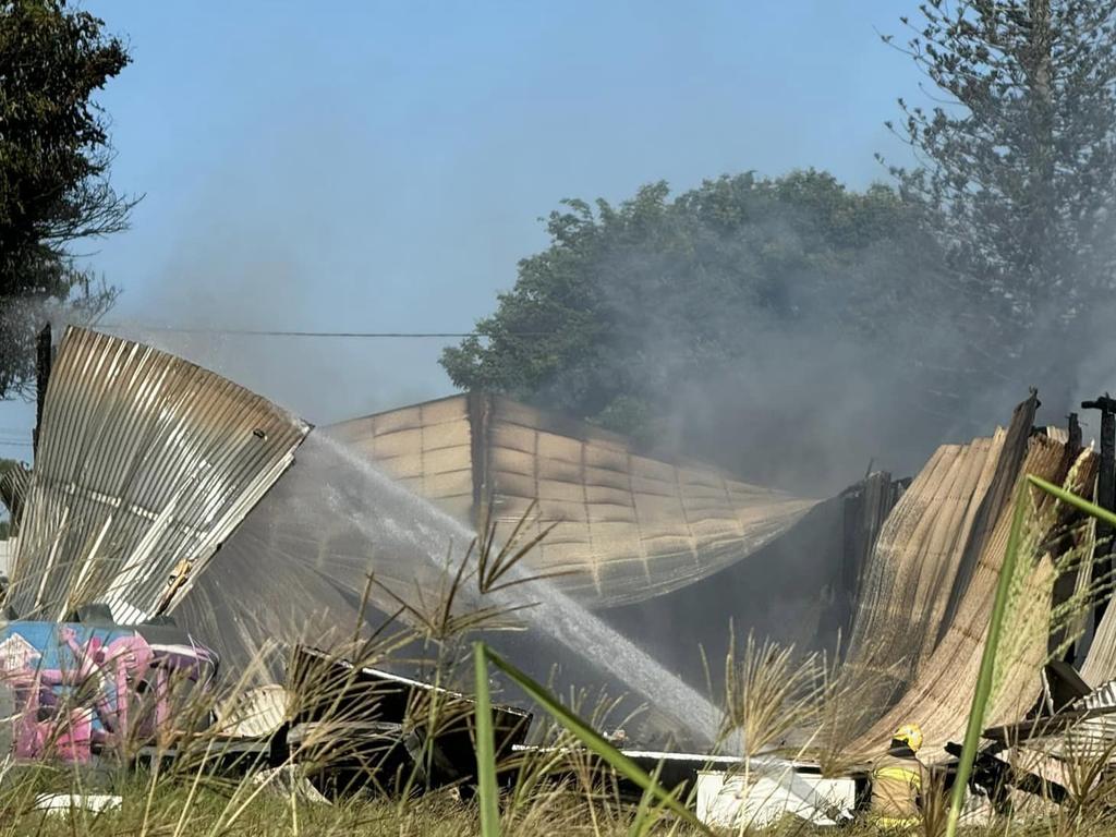 A charity op-shop's storage shed has gone up in flames in an overnight fire. Picture: Bayside Transformations