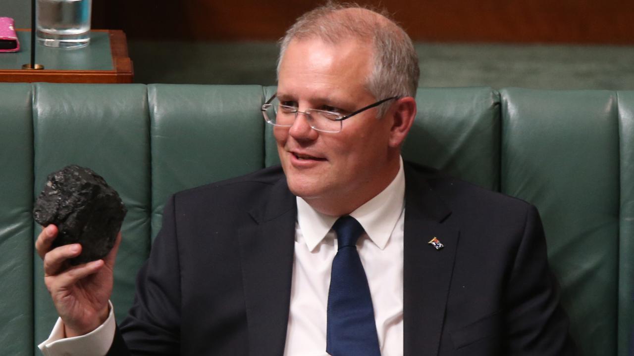 Treasurer Scott Morrison with a lump of coal during Question Time in the House of Representatives Chamber at Parliament House in Canberra. Picture: Kym Smith