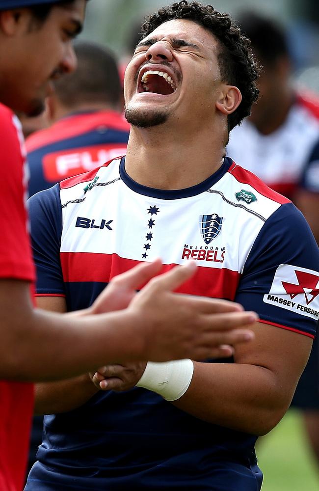 Sione Tuipulotu is obviously happy to be back in training. Picture: Tim Carrafa