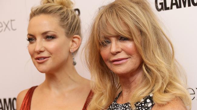 Kate Hudson and Goldie Hawn pose for photographers upon arrival at the Glamour Women Of The Year Awards in London, Tuesday, 2 June, 2015. (Photo by Joel Ryan/Invision/AP)